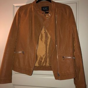Faux jacket. Never worn!! No tags